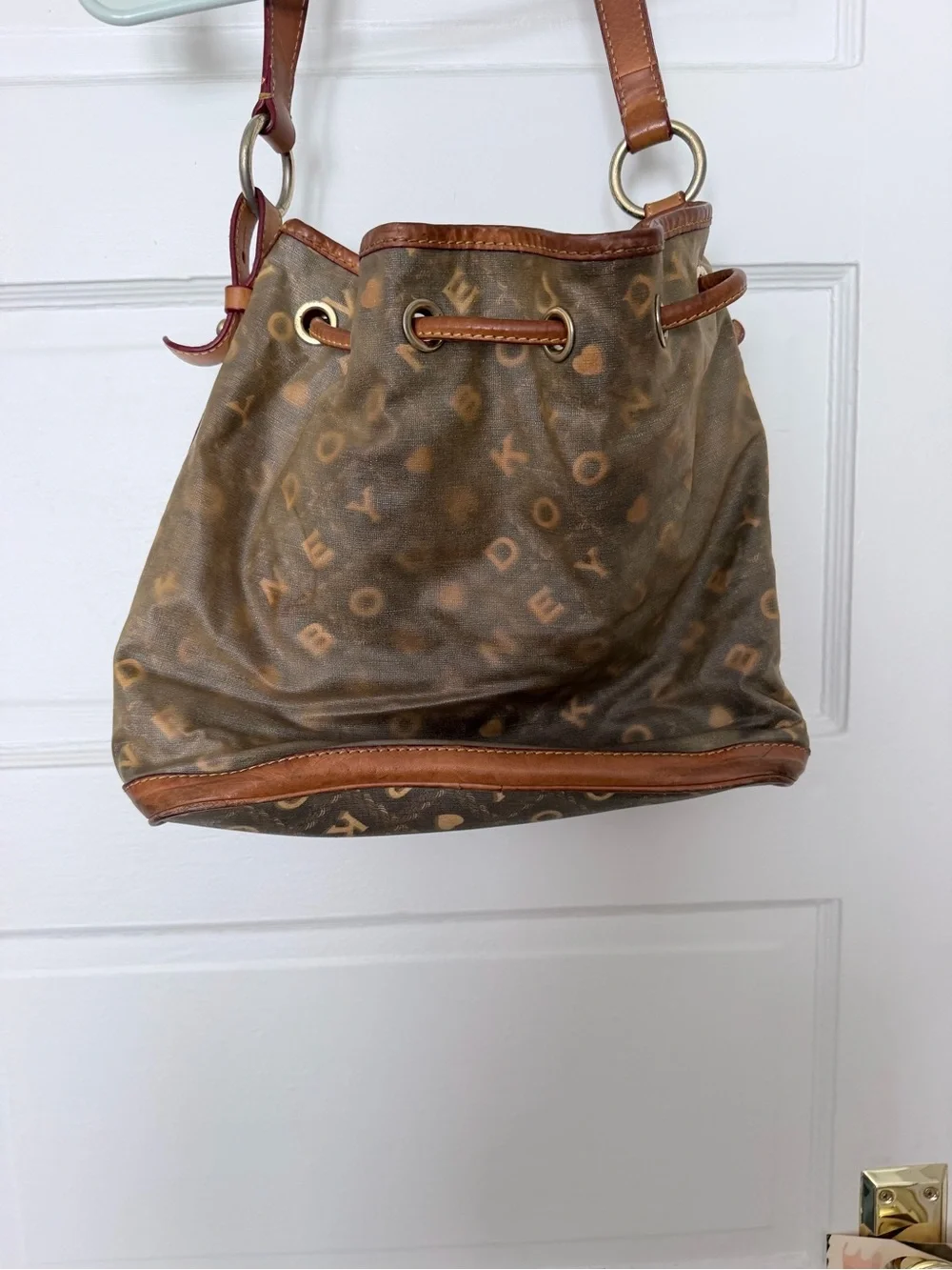 Vintage Dooney & Bourke crossword bucket bag